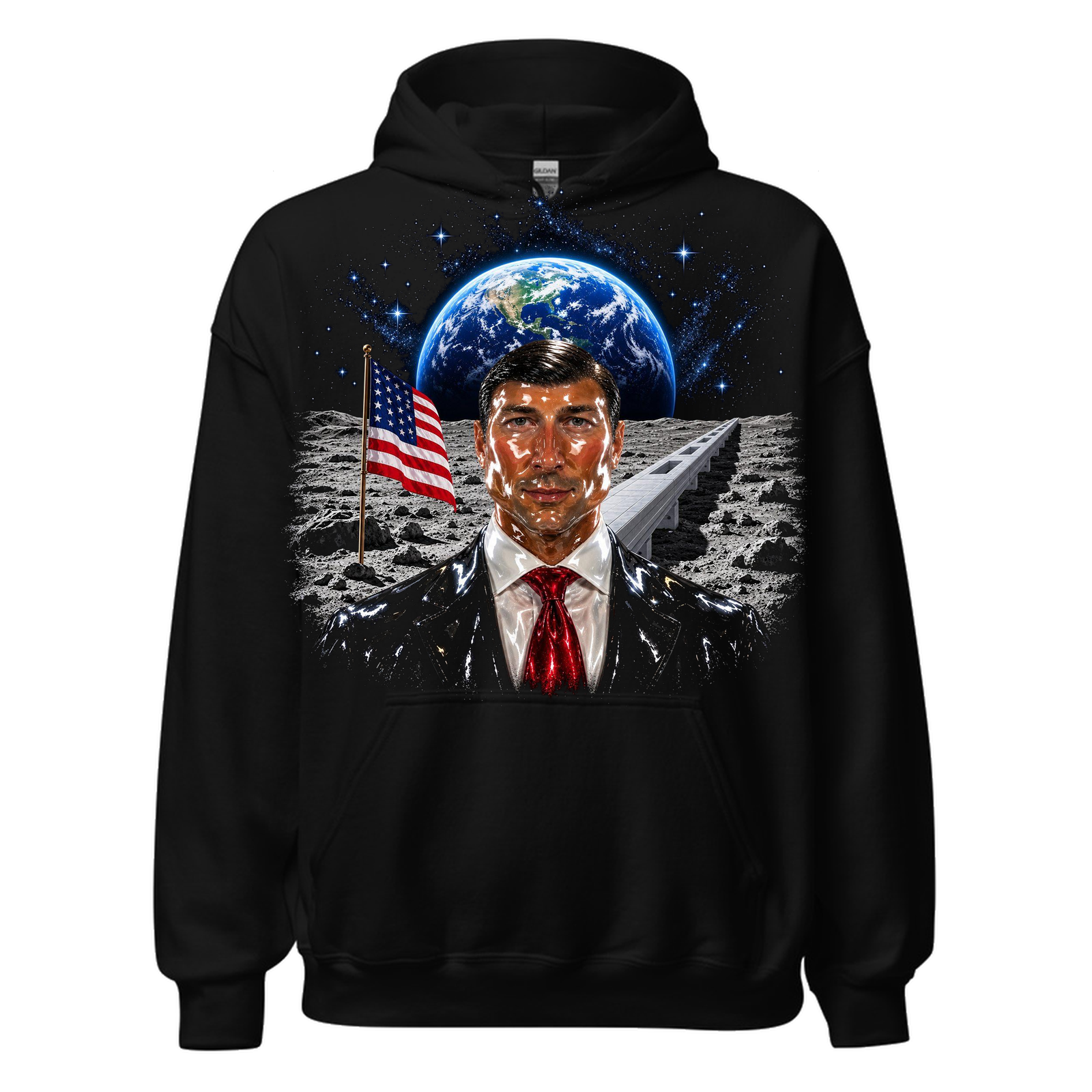 Black hoodie with a large illustration on the chest of a glossy man in a dark suit and red tie on the moon, an American flag beside him, Earth rising behind and a long white walkway to the horizon